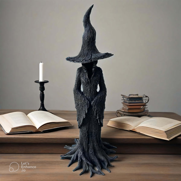 Tall witch sculpture with twisted hat, bark-textured cloak, and tree-root base, made using white silicone mold for Halloween resin or candle making