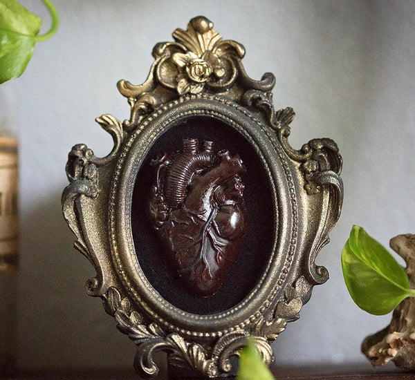 Heart & frame Resin, gypsum, soap, beeswax candle mold