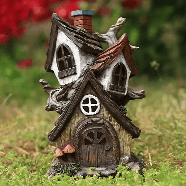 White silicone mold of a whimsical fairy tale house with twisted chimney and stump base – perfect for Candle Making, Resin Art, or Soap Crafting.