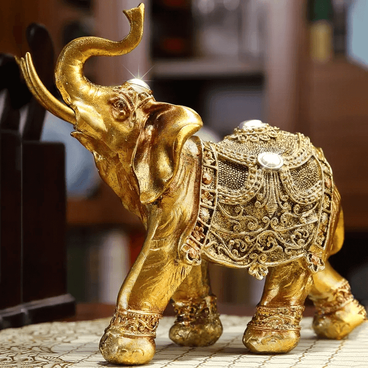  Majestic royal elephant with ornate saddle, trunk raised high, making from silicone mold for resin, plaster, soap, and candle