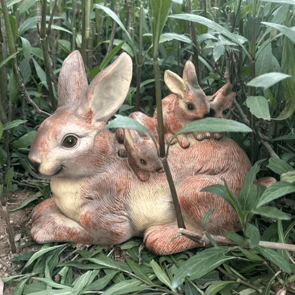 White silicone mold of a sitting large rabbit with baby bunnies – ideal for Candle Making, Soap Making, or Resin Craft.