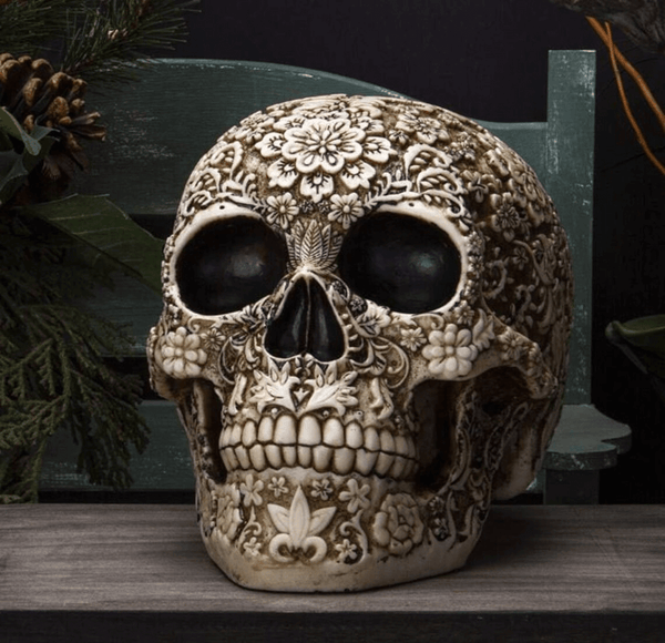  Intricately carved skull silicone mold with floral patterns, ideal for resin, plaster, soap, and candle casting.

