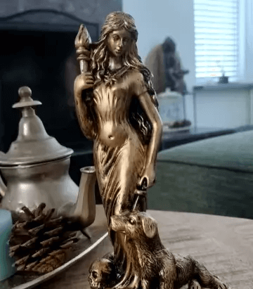 Hecate Greek goddess silicone mold for resin, soap, plaster, and candle crafts, shown with finished statue for reference.

