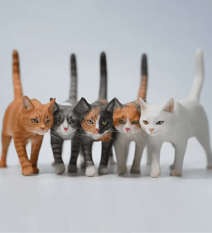 Silicone mold of walking cat with raised tail and natural stride, designed for realistic resin casting


