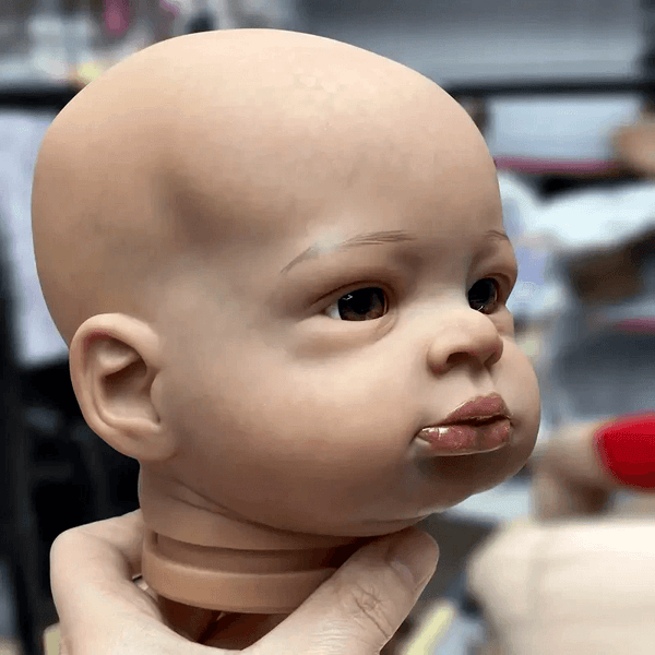 Making a lifelike boy baby doll head with realistic lips and eyes using a 3D silicone mold for resin, plaster, soap, or candle.