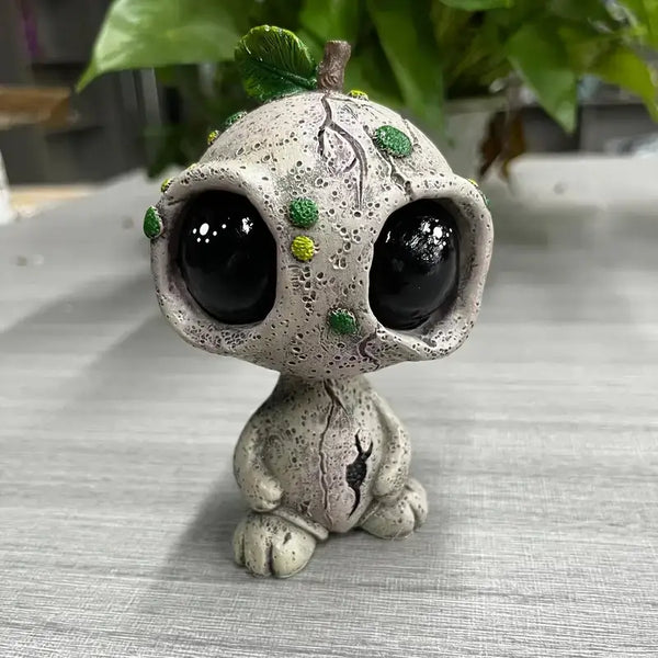 Alien elf silicone mold for resin, plaster, soap, and candle crafts, shown with finished figure for reference.

