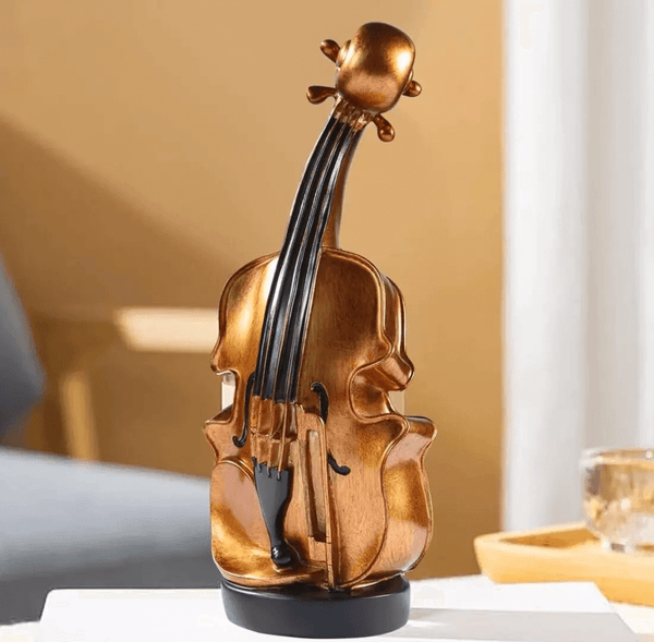 Violin silicone mold for resin, plaster, soap, and candle crafts, shown with finished product for reference.

