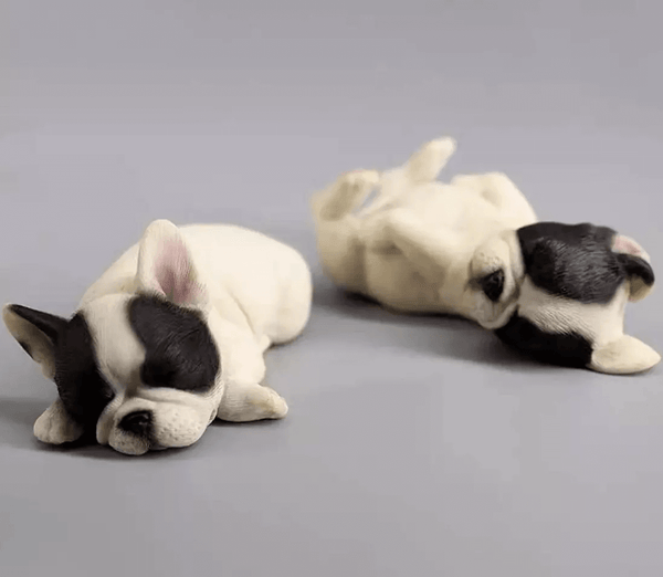 Sleeping French Bulldog silicone mold for resin crafts, perfect for creating adorable dog figurines, shown with finished samples.

