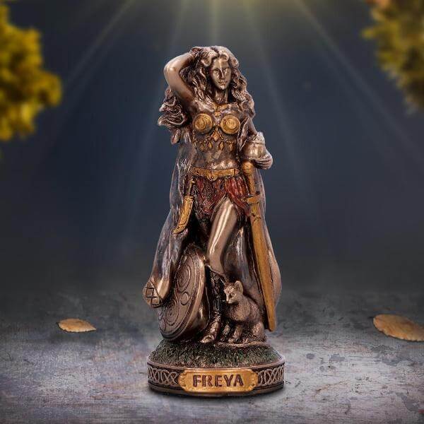 Freya Scandinavian goddess silicone mold for resin, soap, plaster, and candle crafts, shown with finished figurine for reference.

