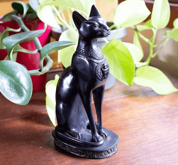 Egyptian Bastet Cat silicone mold for resin, plaster, soap, and candle wax art. Finished figure shown as an example.

