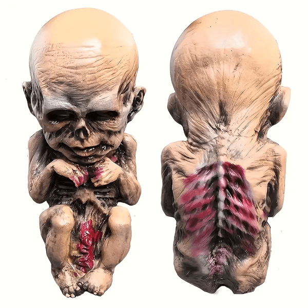 Making a zombie baby sculpture with sunken eyes, open ribs, and torn abdomen using silicone mold