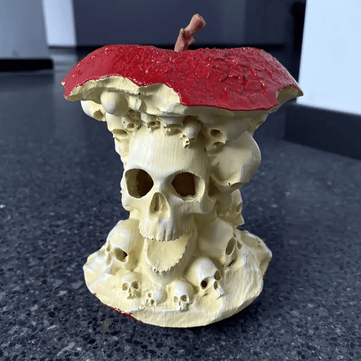 Skull mold with apple top, ideal for resin, soap, plaster, and candle making, created using a silicone mold