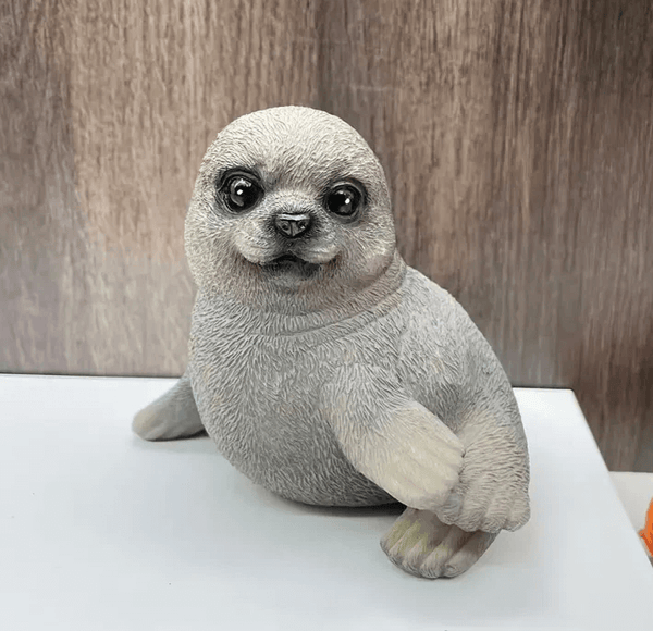 Cute baby sea lion with large eyes and flippers, cast using silicone mold for resin or candle making