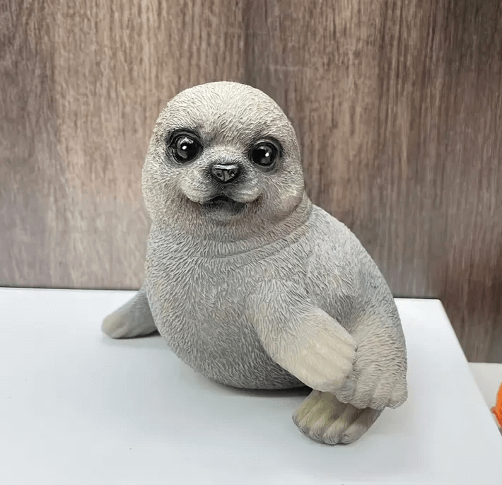 Cute baby sea lion with large eyes and flippers, cast using silicone mold for resin or candle making