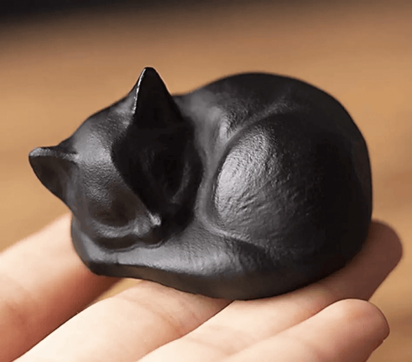  Realistic sleeping cat silicone mold with smooth contours, made from premium silicone for resin and plaster casting.

