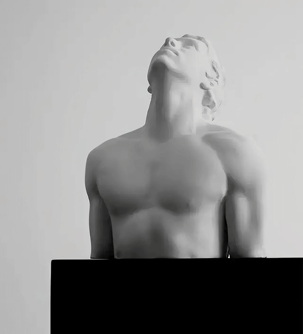 Male upper body sculpture with upward gaze and defined torso form, created using white silicone mold for resin or soap making