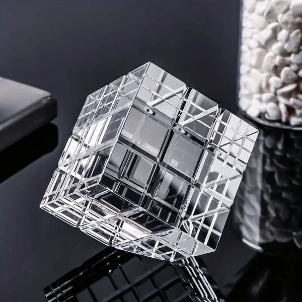 3.5-inch transparent cube silicone mold with intricate grid design for resin, plaster, soap, or candle casting.

