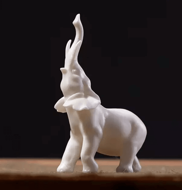  Elephant mold with raised trunk, made from premium silicone for resin casting.

