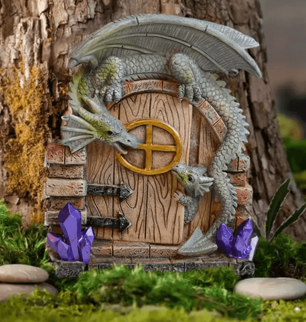 Silicone mold casting of twin dragons positioned around a fantasy door with crystals, for resin, candle, soap, or plaster making