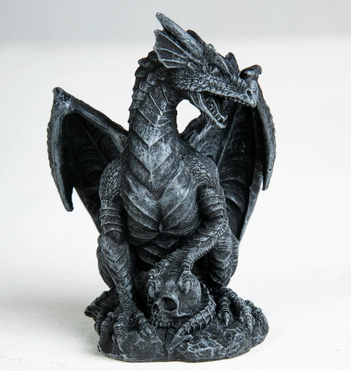 Mini dragon figure with wings spread and seated posture, created using silicone mold for fantasy decor


