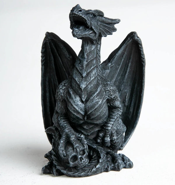 Mini dragon sculpture with spread wings and detailed claws, created using silicone mold for fantasy-themed crafting


