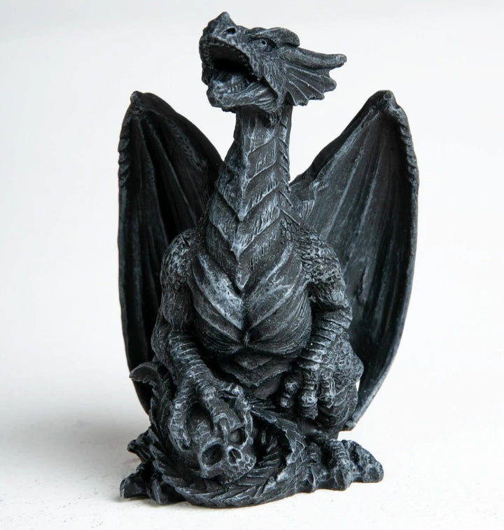 Mini dragon sculpture with spread wings and detailed claws, created using silicone mold for fantasy-themed crafting


