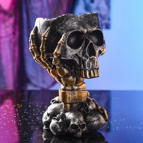 Human skull figure with gothic details and pedestal base, created using silicone mold for horror or fantasy-themed décor


